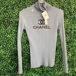 Black turtle neck Chanel